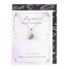 Crystal moon necklace featuring amethyst, symbolizing calming, protection, and inner strength on a decorative card.