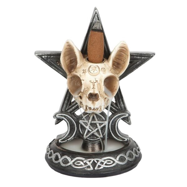 A decorative skull and star sculpture featuring intricate designs and mystical symbols, perfect for altars.