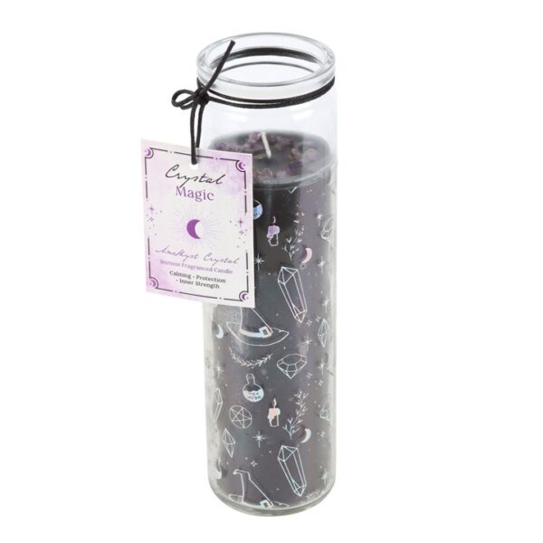 A black candle adorned with crystal-themed designs, labeled "Crystal Magic," promoting calming and protection.