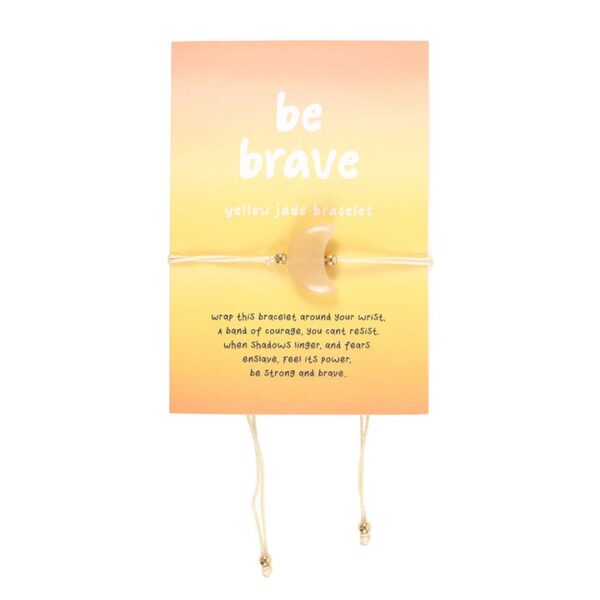 "Yellow jade bracelet packaging with inspiring message encouraging bravery and courage to face fears."